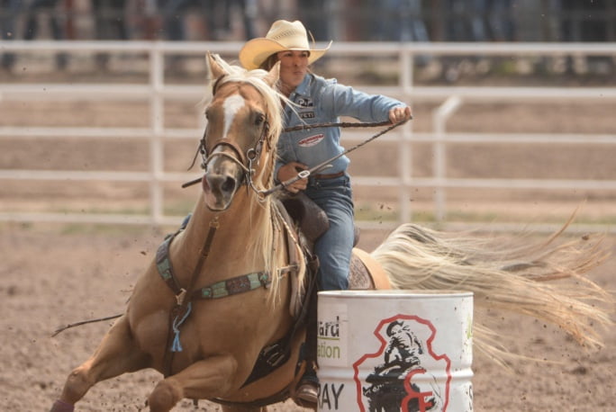 Competitor barrel racing